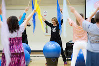 Carrie Ekins, creator of Drums Alive ®, leads teachers through DRUMTASTIC! Photo by Lorenzo Hubbert.