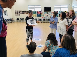 Emerita dance professor Marilyn Berrett transformed a fourth-grade lesson on cloud formations into an opportunity to explore the weather through dance. Photo by Emma Smith.
