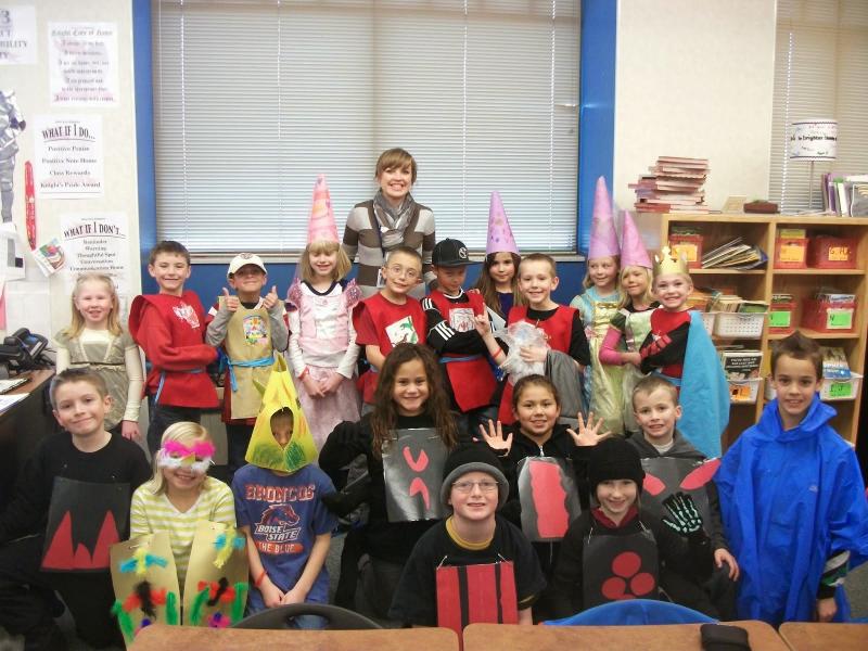 class of young students wearing drama costumes
