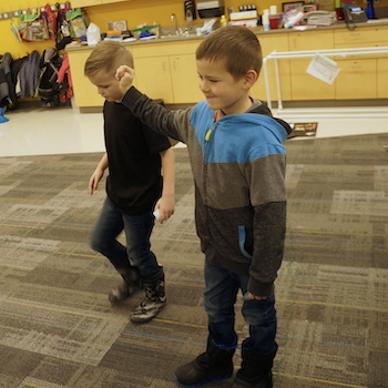 two students dancing