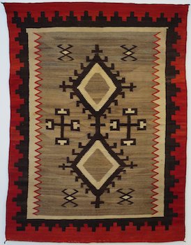 red and brown Navajo blanket
