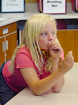 Student making wind sound