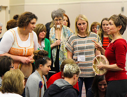 Members of the ARTS partnership discussing a musical number.