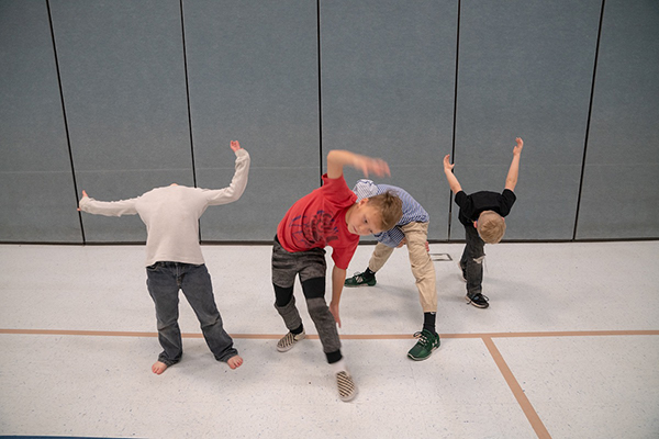 Students dancing in zero gravity