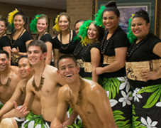 pacific islanders in grass skirts