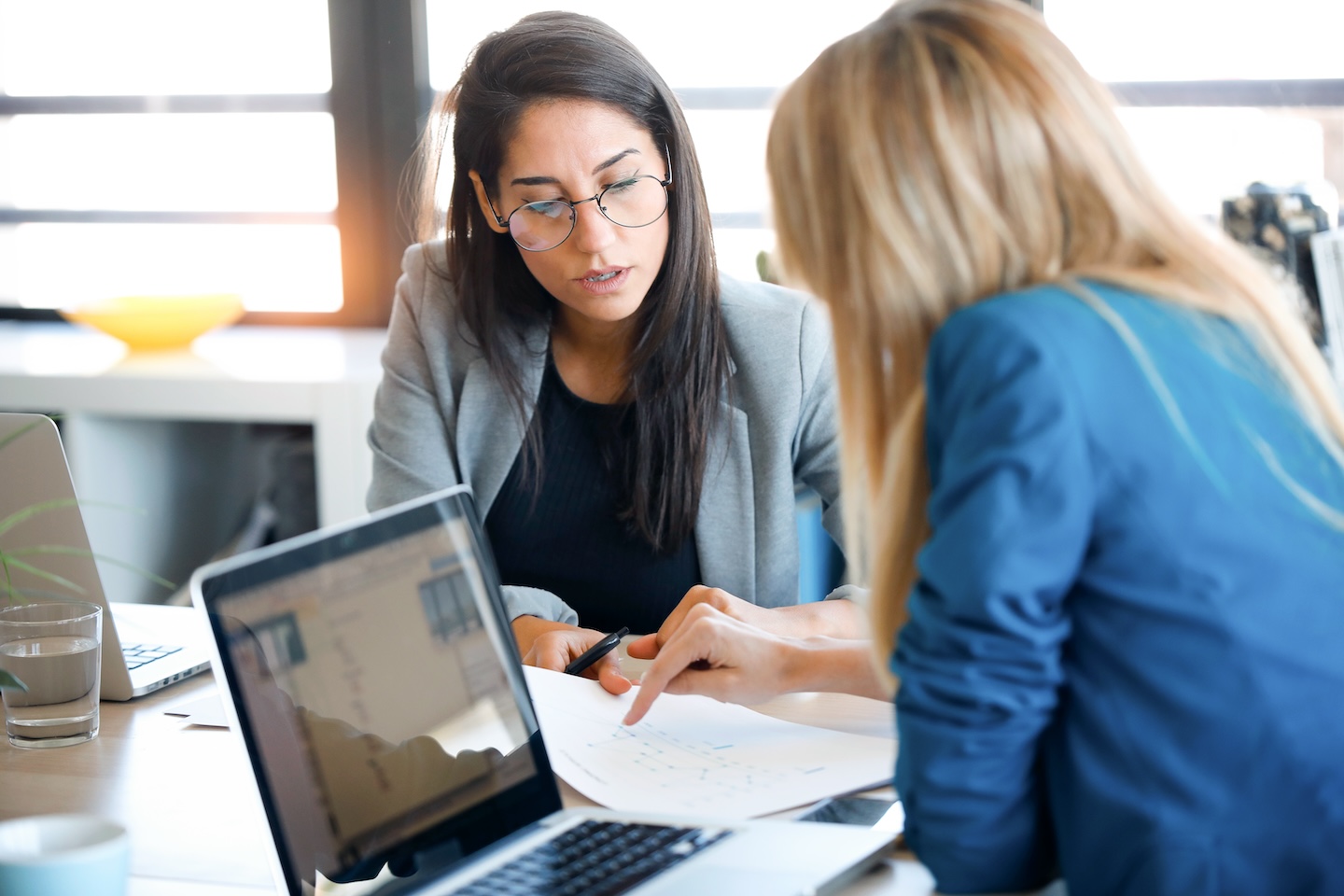 Two woman discussing