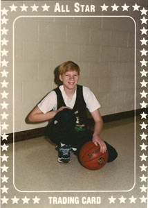 boy posing with a basketball