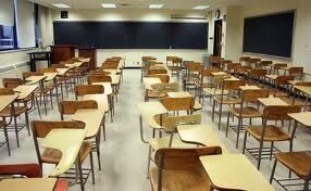 desks in an empty classroom