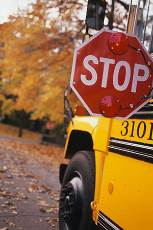 school bus with stop sign