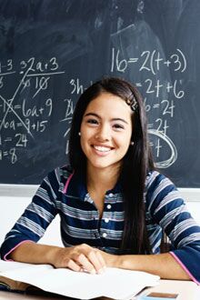 girl smiling while reading