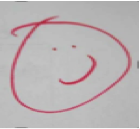 smiling face drawn with whiteboard marker