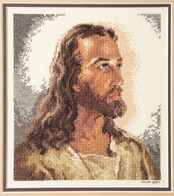 An image of a cross-stitched portrait of Jesus Christ by Mary Anne Prater