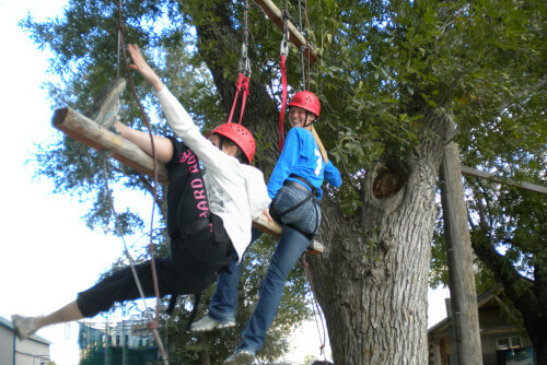 kids doing a rope course