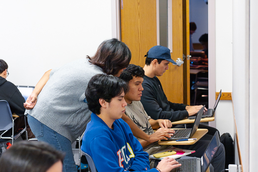people typing on computers