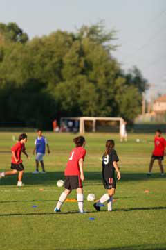 girls playing soccer