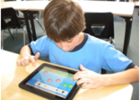 boy using tablet