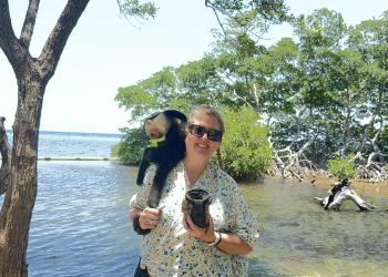 Picture of Beth with a monkey on her shoulder.
