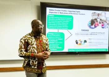 Papa Kobina presenting his thesis.