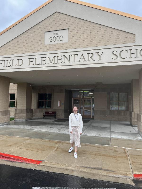 Practicum Bethany outside school walking
