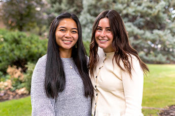The ComD Student Mentors stand near the Taylor Building on BYU campus.