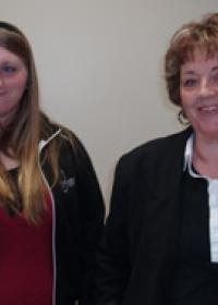 Two women smiling